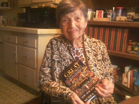 Gina, Victor Royer's mother, holds her son's book 'Great Casino Slots' 